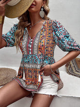 Women's new tassel V-neck printed casual resort style top