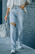 Women's Irregularly Ripped Denim Trousers