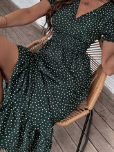 New women's casual holiday polka dot v-neck mid-length dress